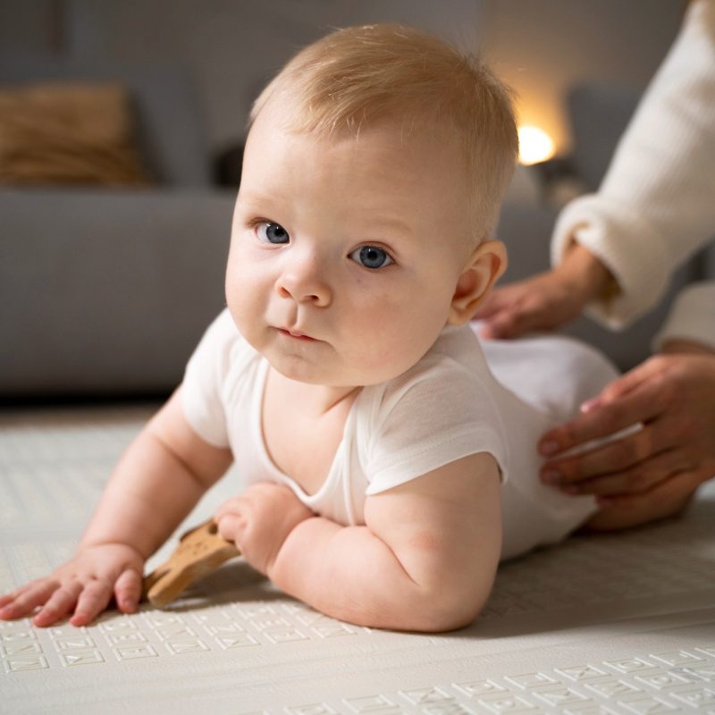 close-up-baby-crawling-learning-walk